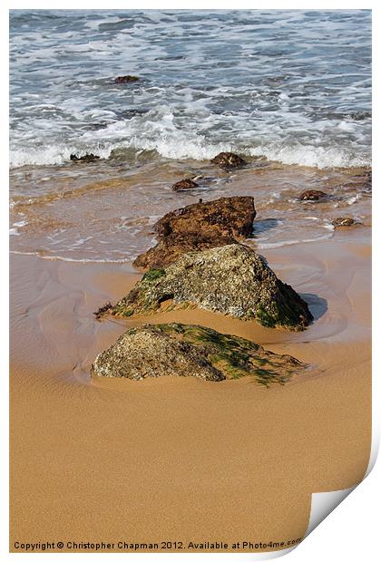 Rocks in the surf on Ramla Bay Print by Christopher Chapman