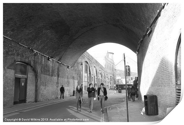 A Stroll under the arches Print by David Wilkins