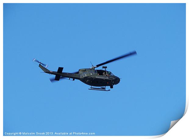 Military helicopter over Malta Print by Malcolm Snook